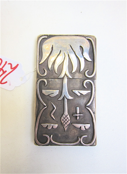 Appraisal: NATIVE AMERICAN SILVER CARD CASE unmarked with raised symbolic design