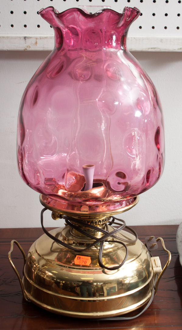 Appraisal: Veritas Lampe cranberry glass and brass oil lamp Condition Electrified