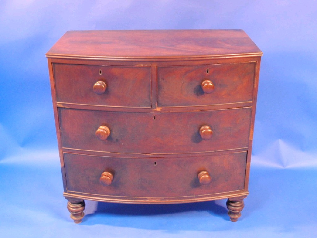 Appraisal: A Victorian flamed mahogany bow front chest of two short