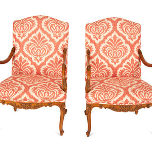 Appraisal: A Pair of R gence Style Walnut Fauteuils th Century