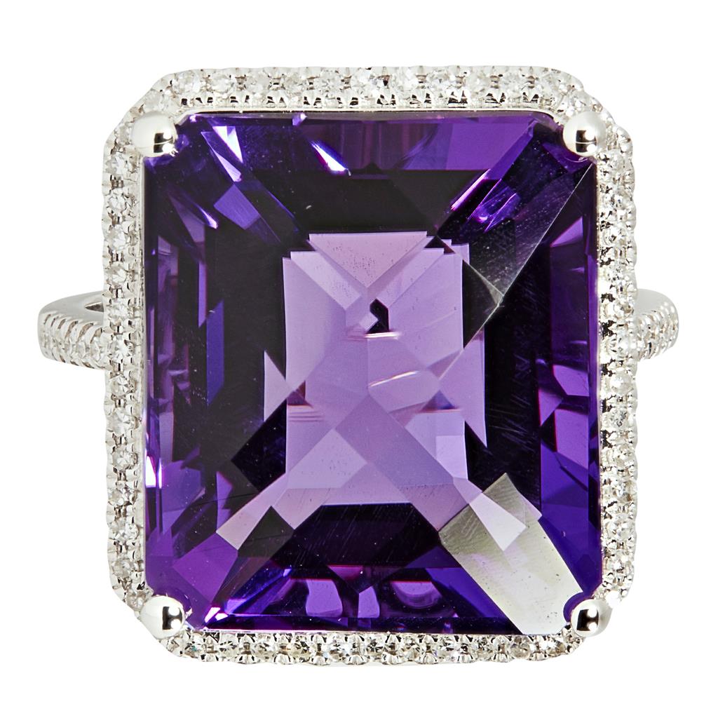 Appraisal: An amethyst and diamond set cocktail ring claw set with