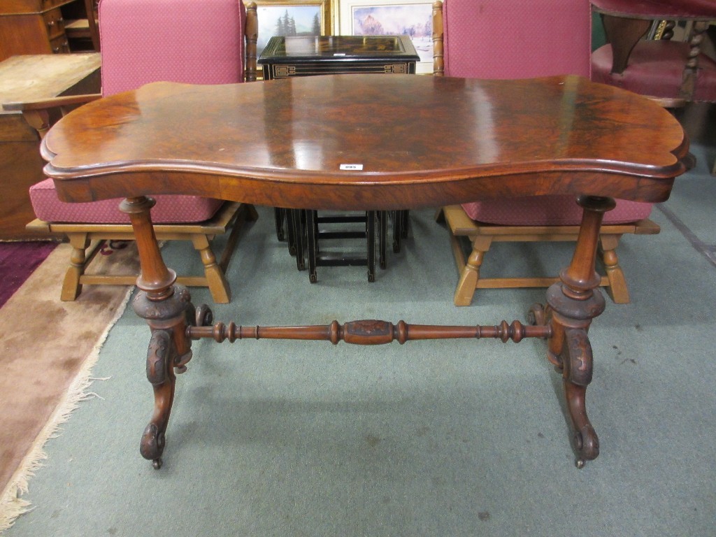 Appraisal: Victorian walnut shaped window table