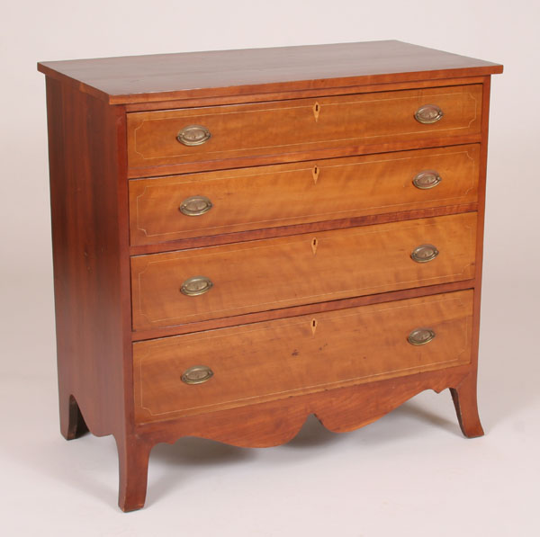 Appraisal: Early four drawer cherry chest with string banding Sheraton styling