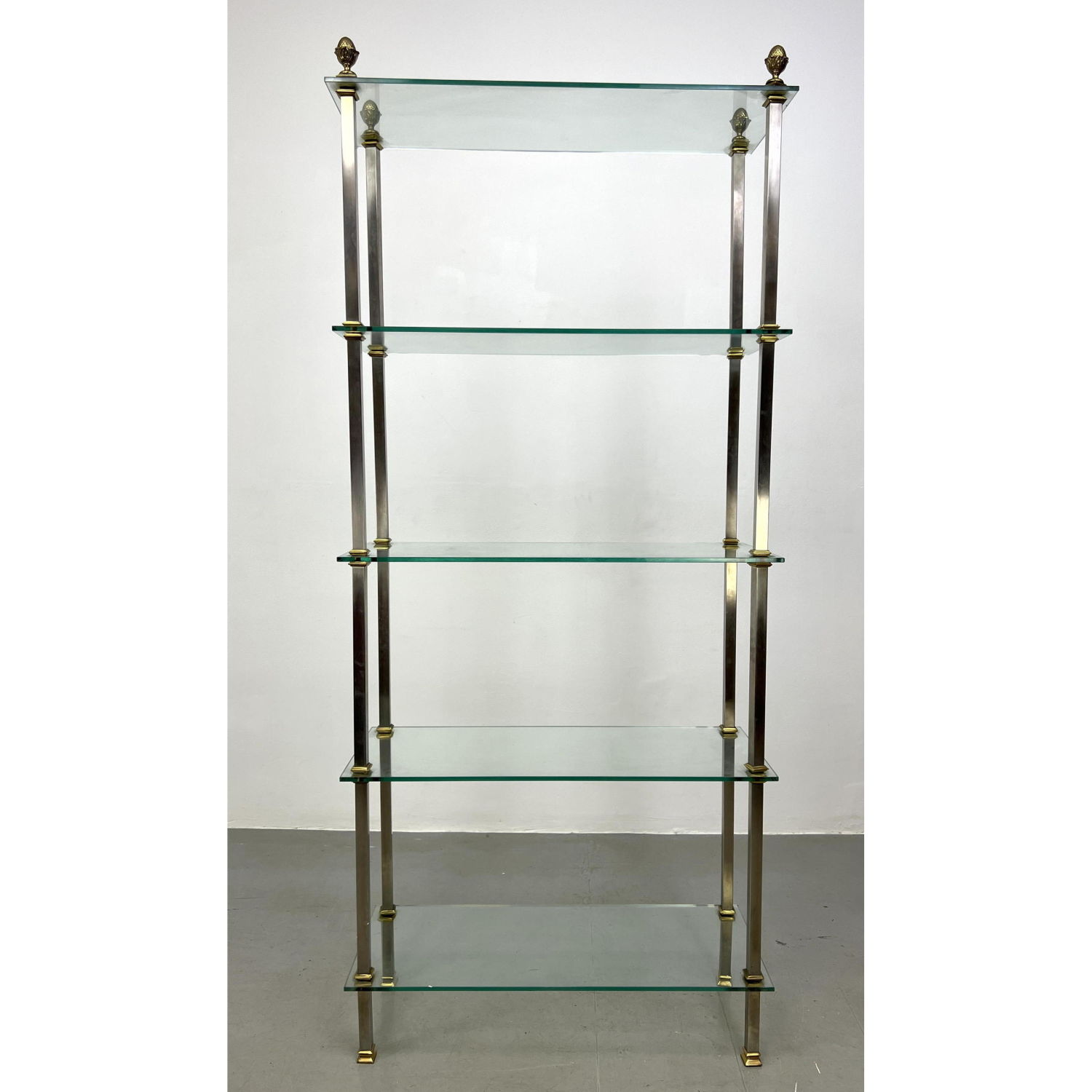 Appraisal: Regency style Stainless and Brass Etagere Thick glass shelves Pine