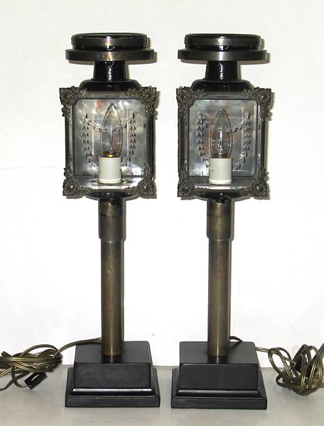 Appraisal: A pair of t le and brass carriage lanterns late