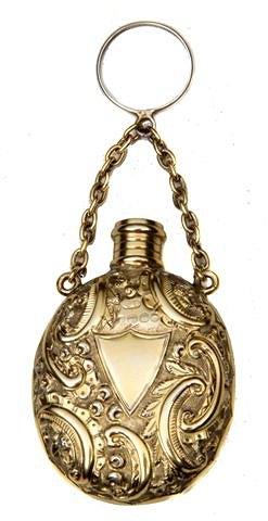 Appraisal: A VICTORIAN SILVER GILT SCENT BOTTLE oval shaped with pressed