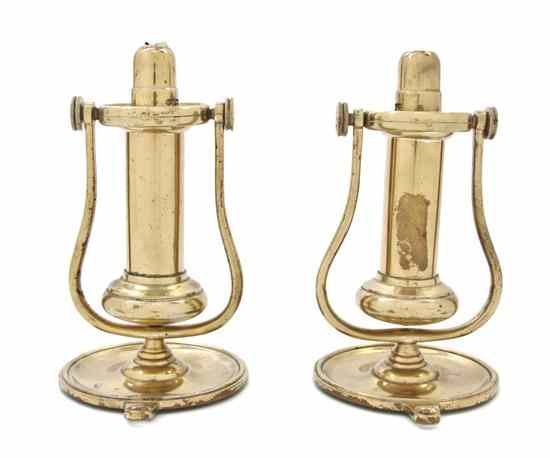 Appraisal: A Pair of Brass Nautical Sconces each circular backplate issuing