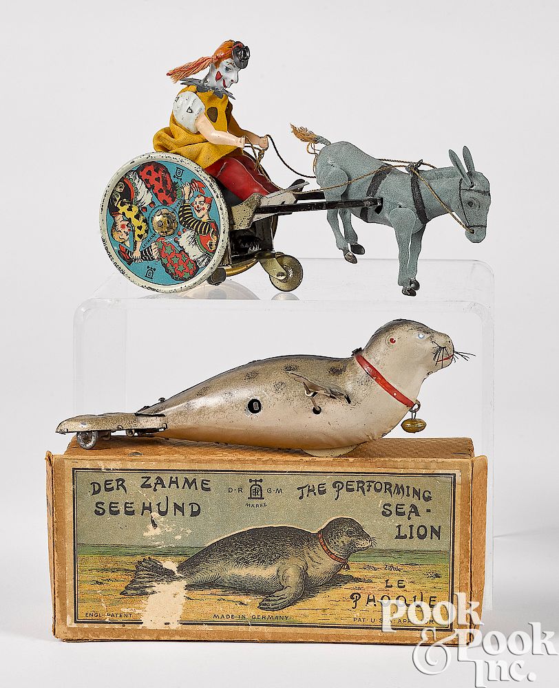 Appraisal: Two Lehmann wind-up tin toys Two Lehmann wind-up tin toys