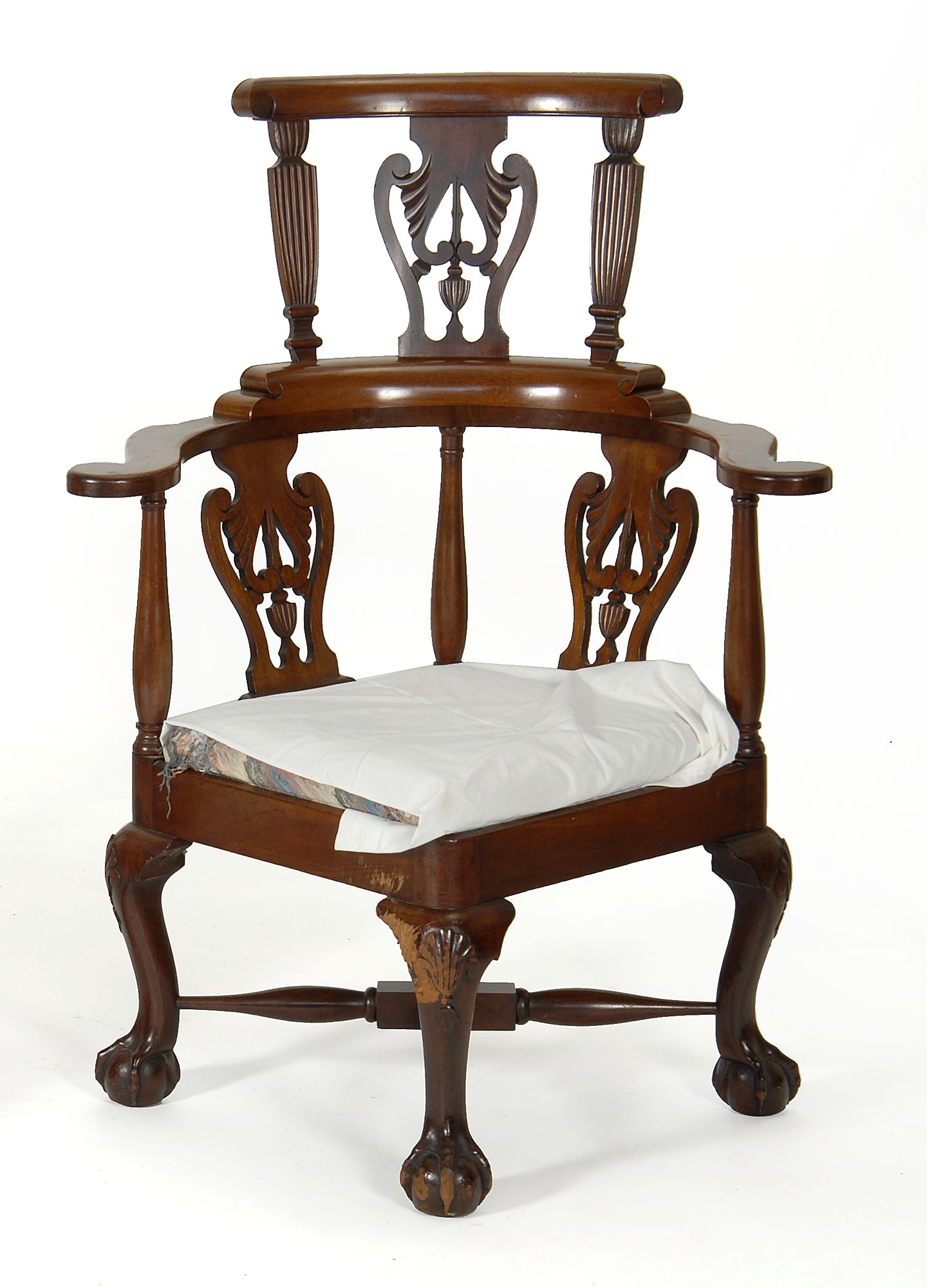 Appraisal: CHIPPENDALE-STYLE CORNER CHAIR in mahogany With crest rail and three