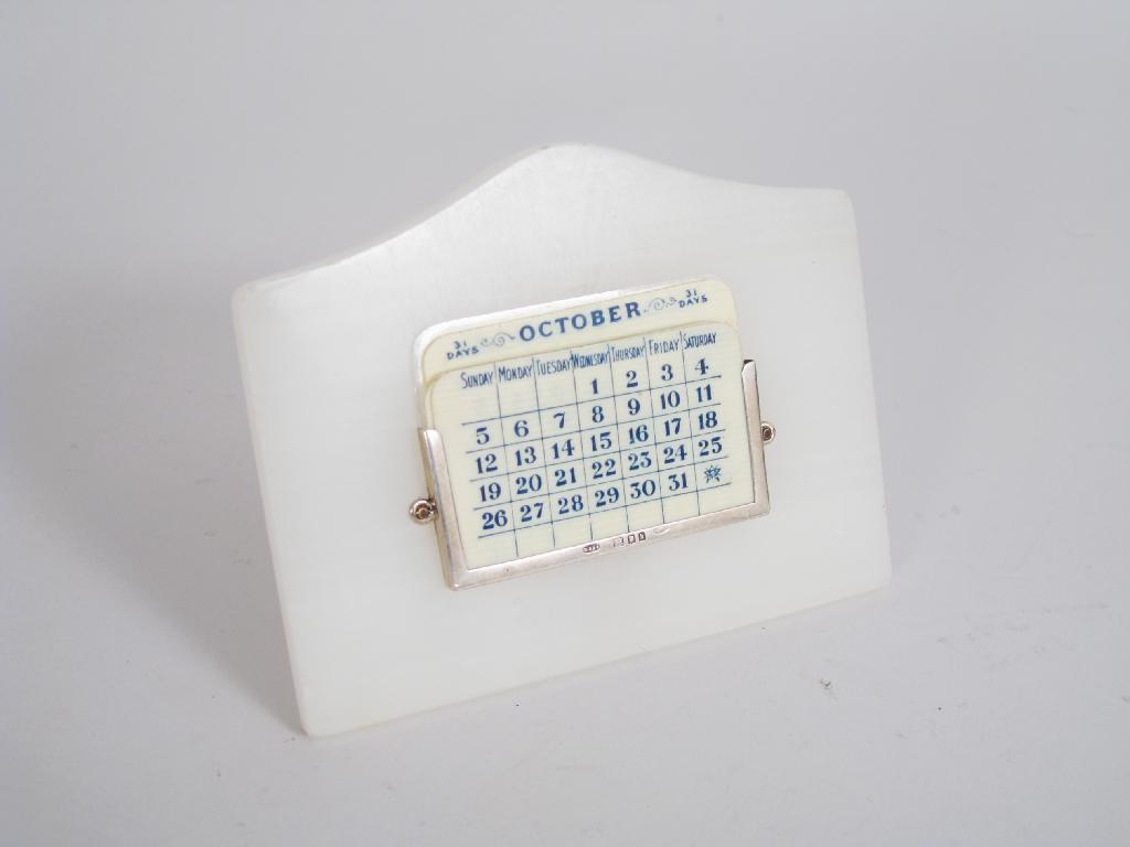 Appraisal: A George V silver mounted alabaster Perpetual Calendar London with