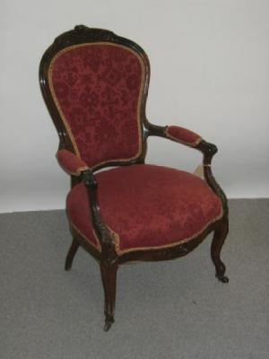 Appraisal: A ROSEWOOD FRAMED FAUTEUIL th century upholstered in red tapestry