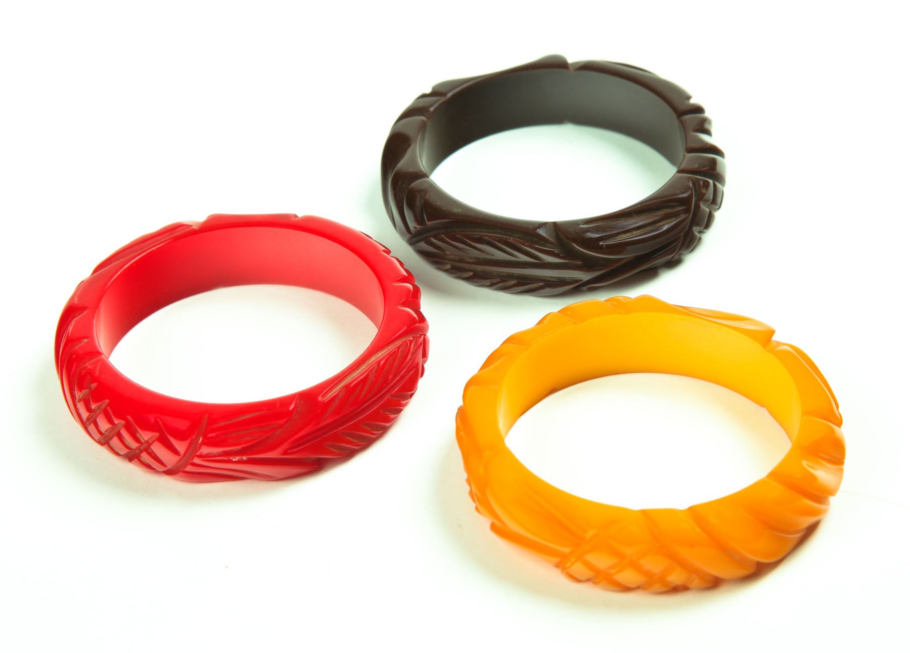 Appraisal: THREE BAKELITE BRACELETS American st half- th century Dark brown