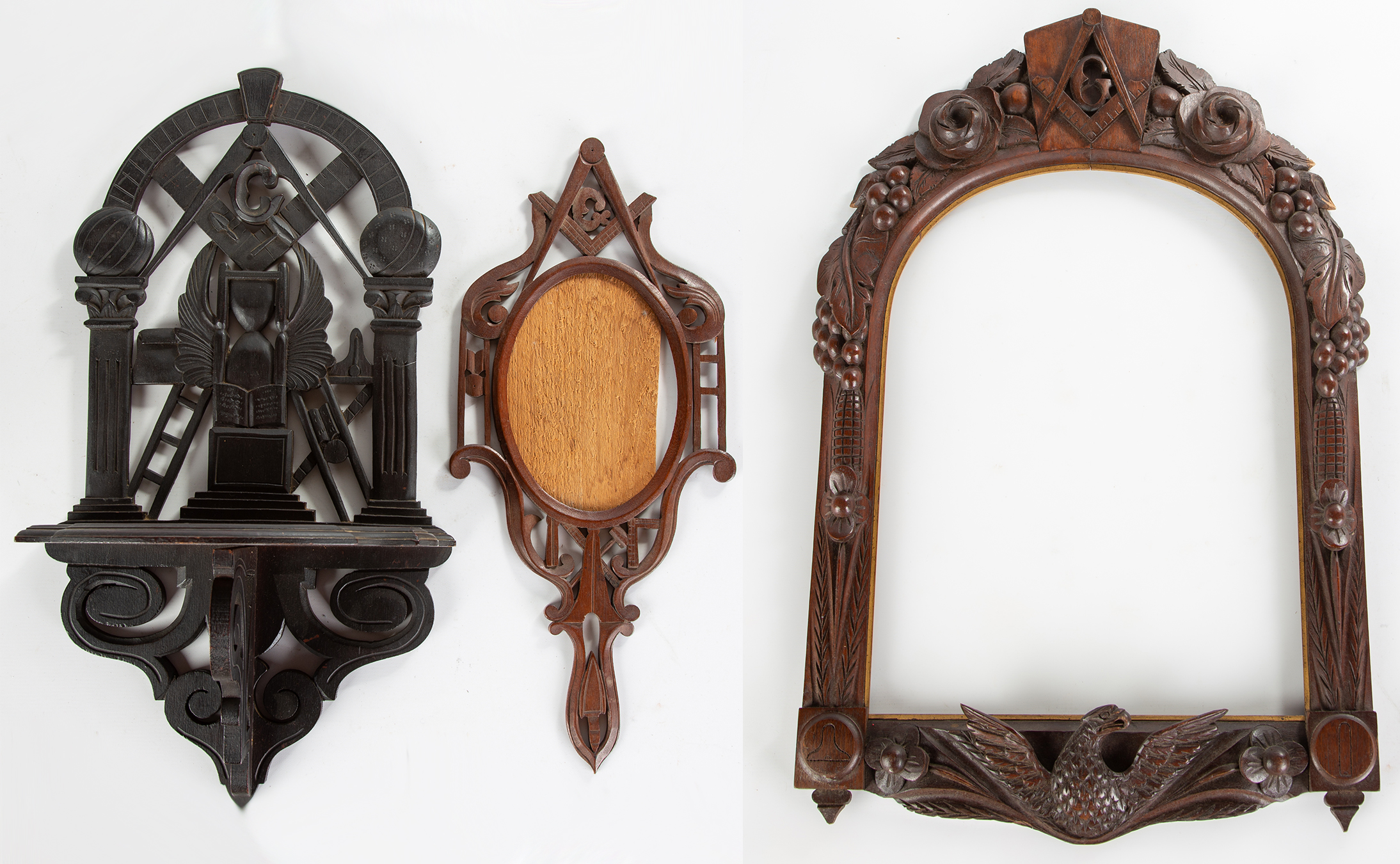 Appraisal: MASONIC CARVED PICTURE FRAMES AND CARVED MASONIC SHELF th Century