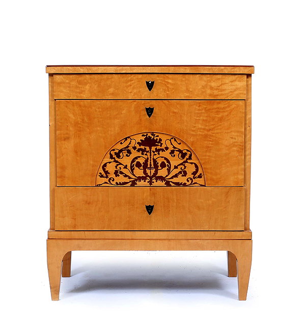 Appraisal: A BIEDERMEIER STYLE CHEST of three drawers the large central