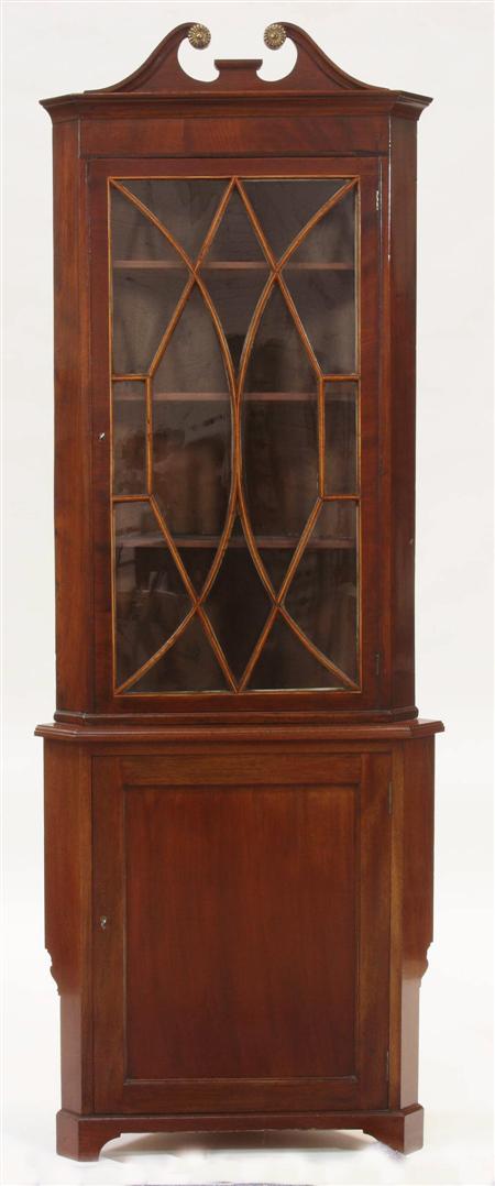 Appraisal: An Edwardian mahogany inlaid corner cabinet and base with swan