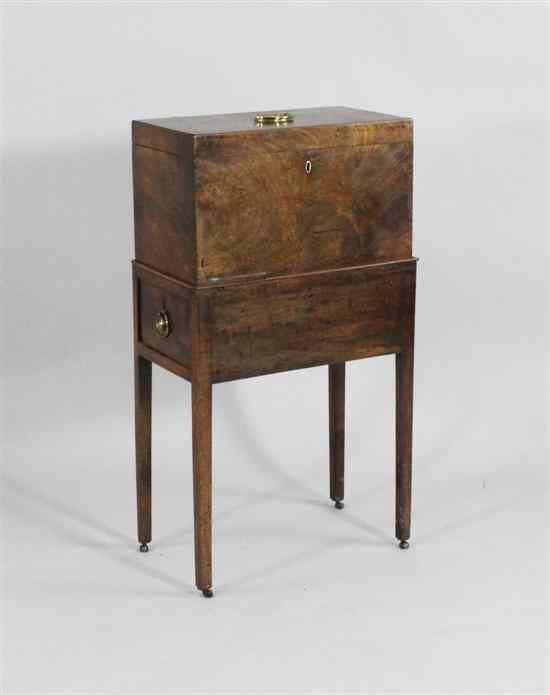 Appraisal: A George III mahogany tea caddy on stand with side