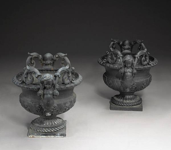 Appraisal: A pair of French cast iron garden urns J J