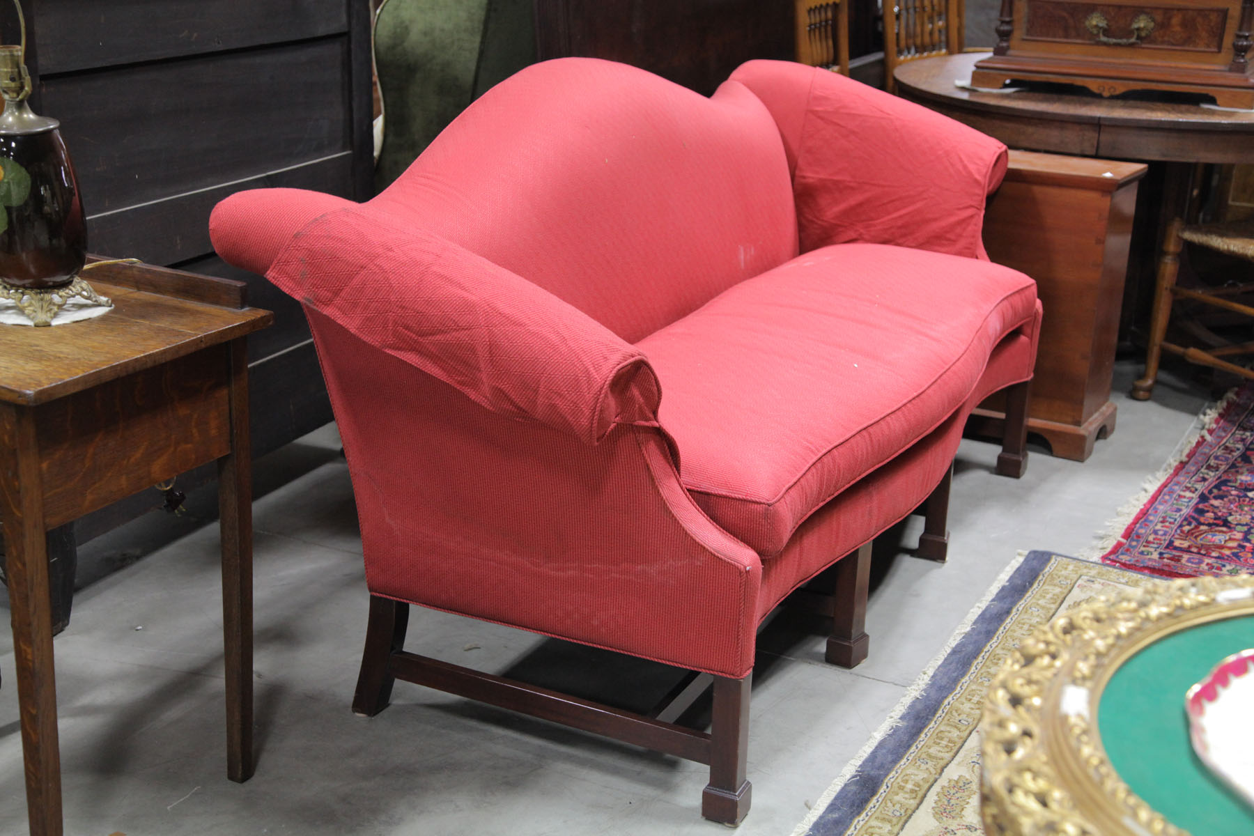 Appraisal: SOFA American th century Mahogany frame with red upholstery and