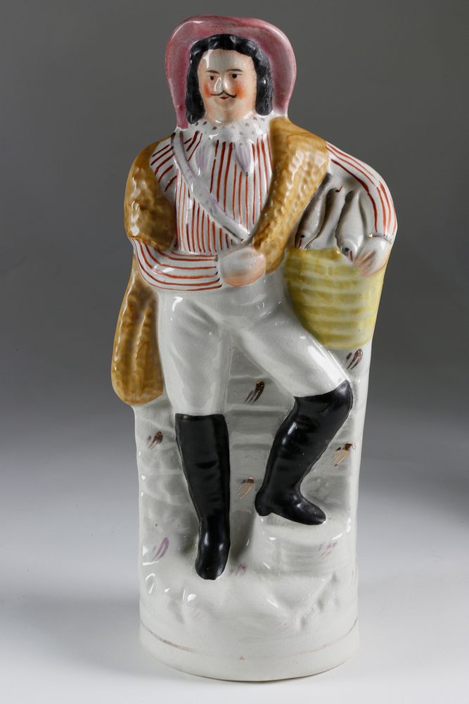 Appraisal: English Staffordshire Standing Figure of a Fish Monger English Staffordshire