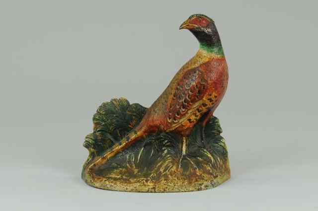 Appraisal: HUBLEY PHEASANT DOORSTOP Hubley signed '' Fred Everett '' finely