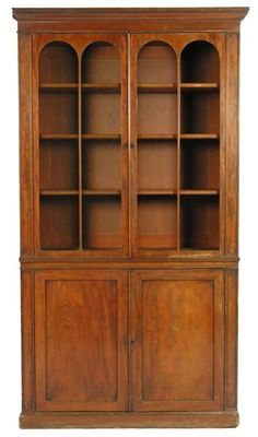 Appraisal: A mahogany bookcase part of a larger structure the shelves