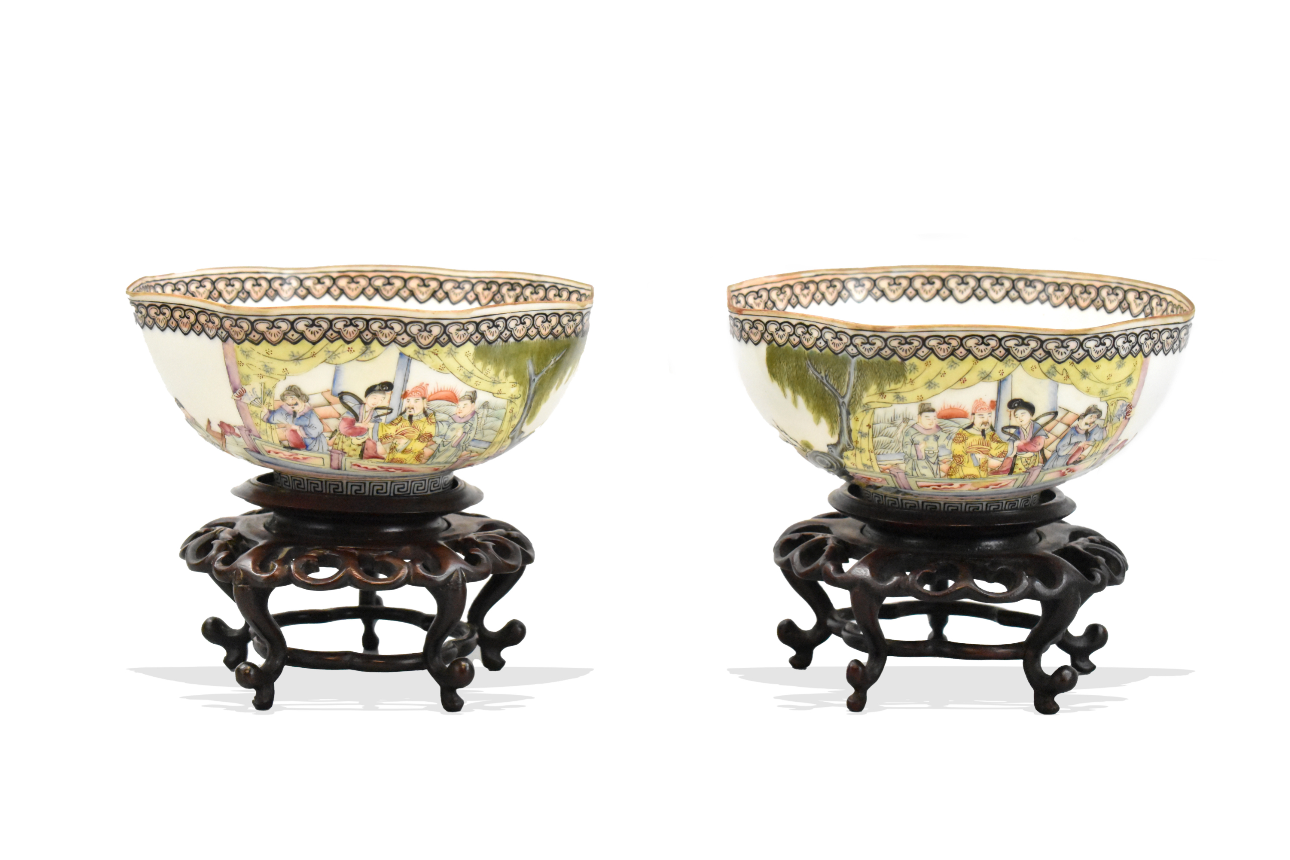 Appraisal: A pair of eggshell famille rose octagonal bowls with stands