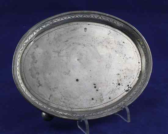 Appraisal: A George III silver oval teapot stand with engraved border