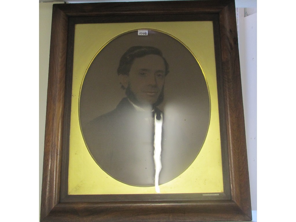 Appraisal: Charcoal portrait in a rosewood frame