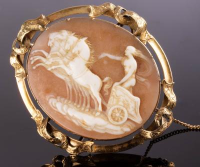 Appraisal: A Victorian shell cameo brooch depicting a charioteer on a