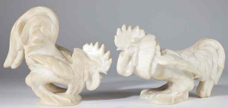 Appraisal: Two Marble Fighting Cocks th century white marble with pale