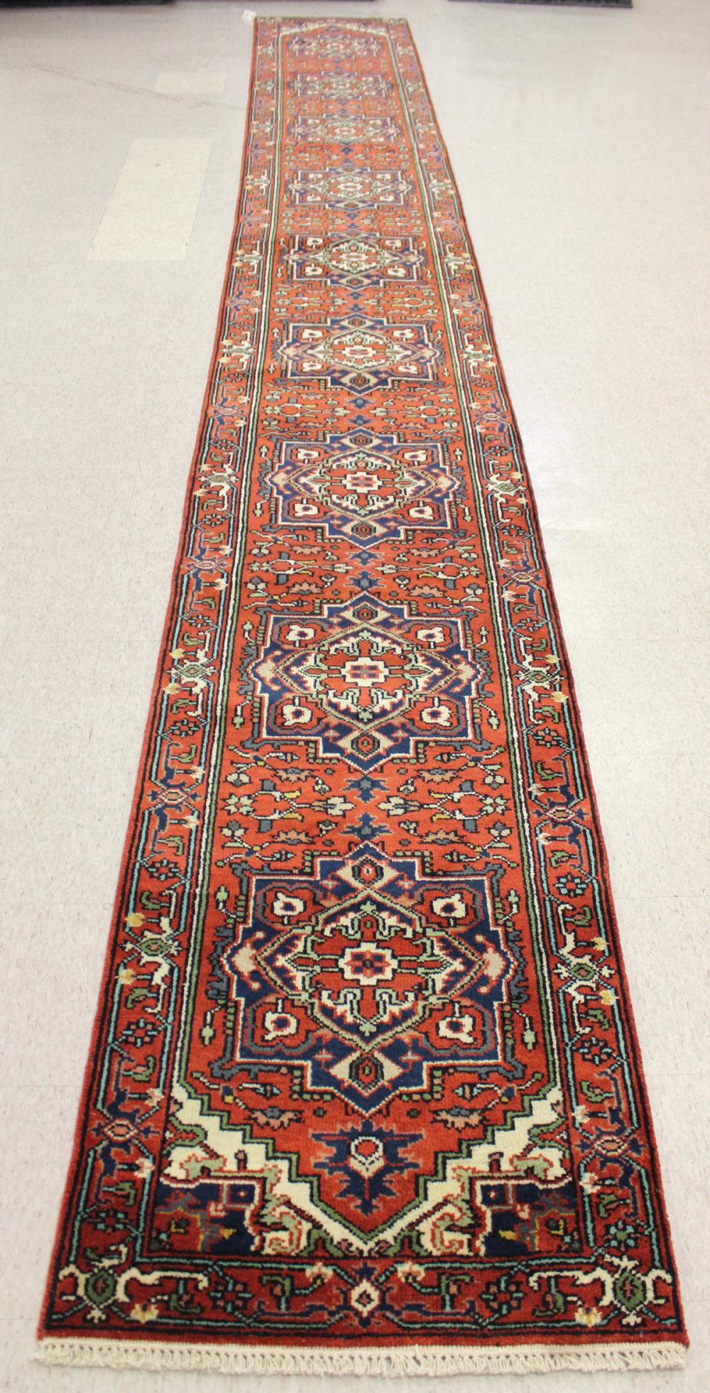 Appraisal: HAND KNOTTED ORIENTAL RUNNER Persian Serab design comprising nine geometric