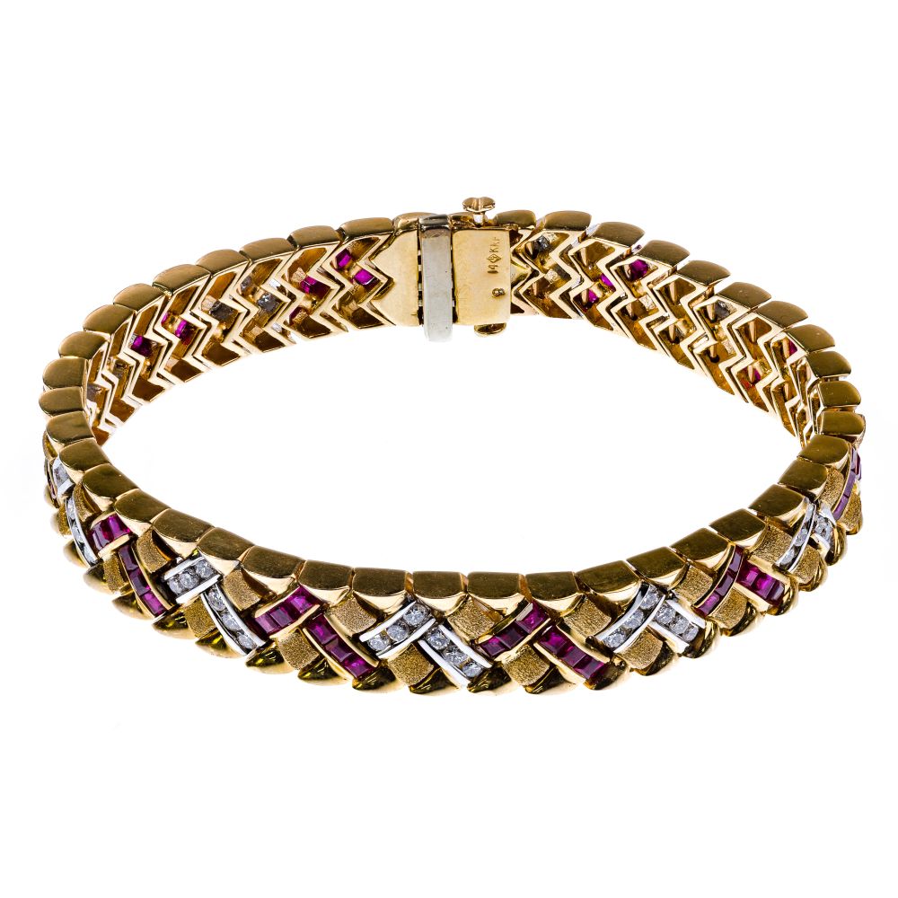 Appraisal: K YELLOW GOLD RUBY AND DIAMOND BRACELETHaving princess cut rubies