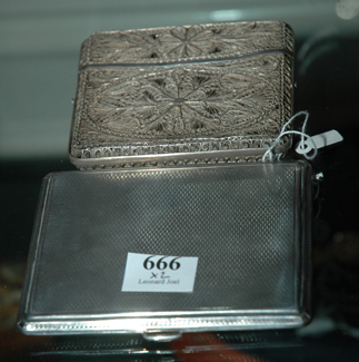 Appraisal: A STERLING SILVER CIGARETTE CASE AND A FILLIGREE CARD CASE