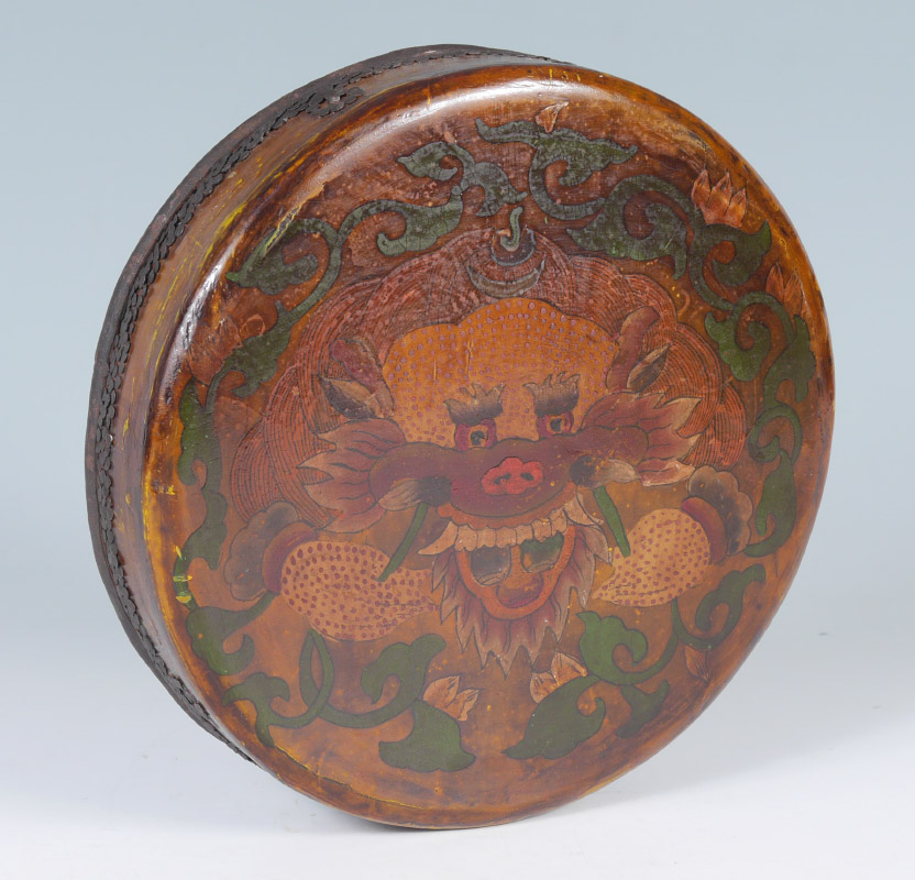 Appraisal: TIBETAN POLYCHROME TEMPLE HAND DRUM Wood and leather construction polychrome