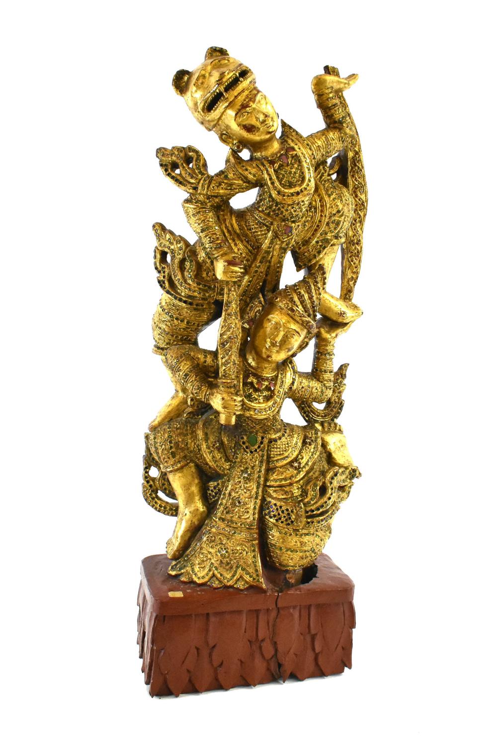 Appraisal: THAI CARVED AND GILT LACQUERED WOOD FIGURAL GROUPEarly to mid-