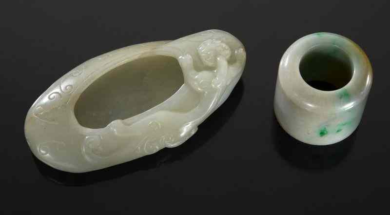 Appraisal: Chinese Qing jade carvings including archer's ring brush washer Largest