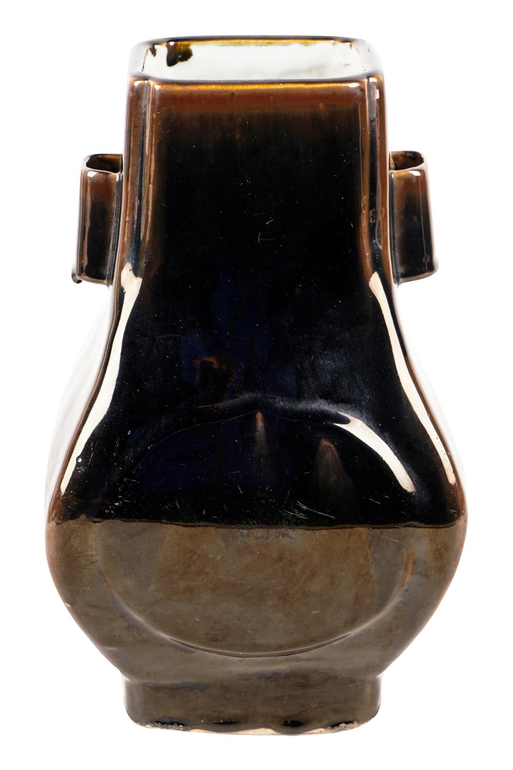 Appraisal: CHINESE GLAZED CERAMIC VASEunsigned brown-glazed with white interior inches wide