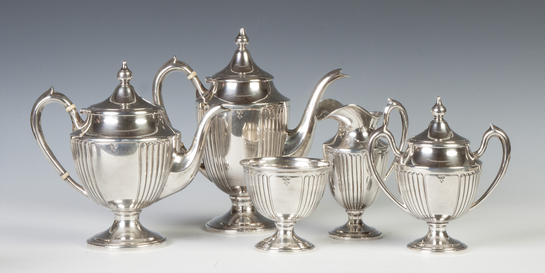 Appraisal: Sterling Silver Five-Piece Coffee Tea Set Early th cent Fluted