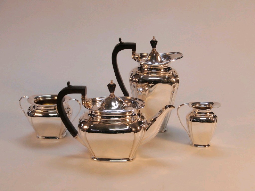 Appraisal: An electroplated four piece tea service comprising tea pot hot