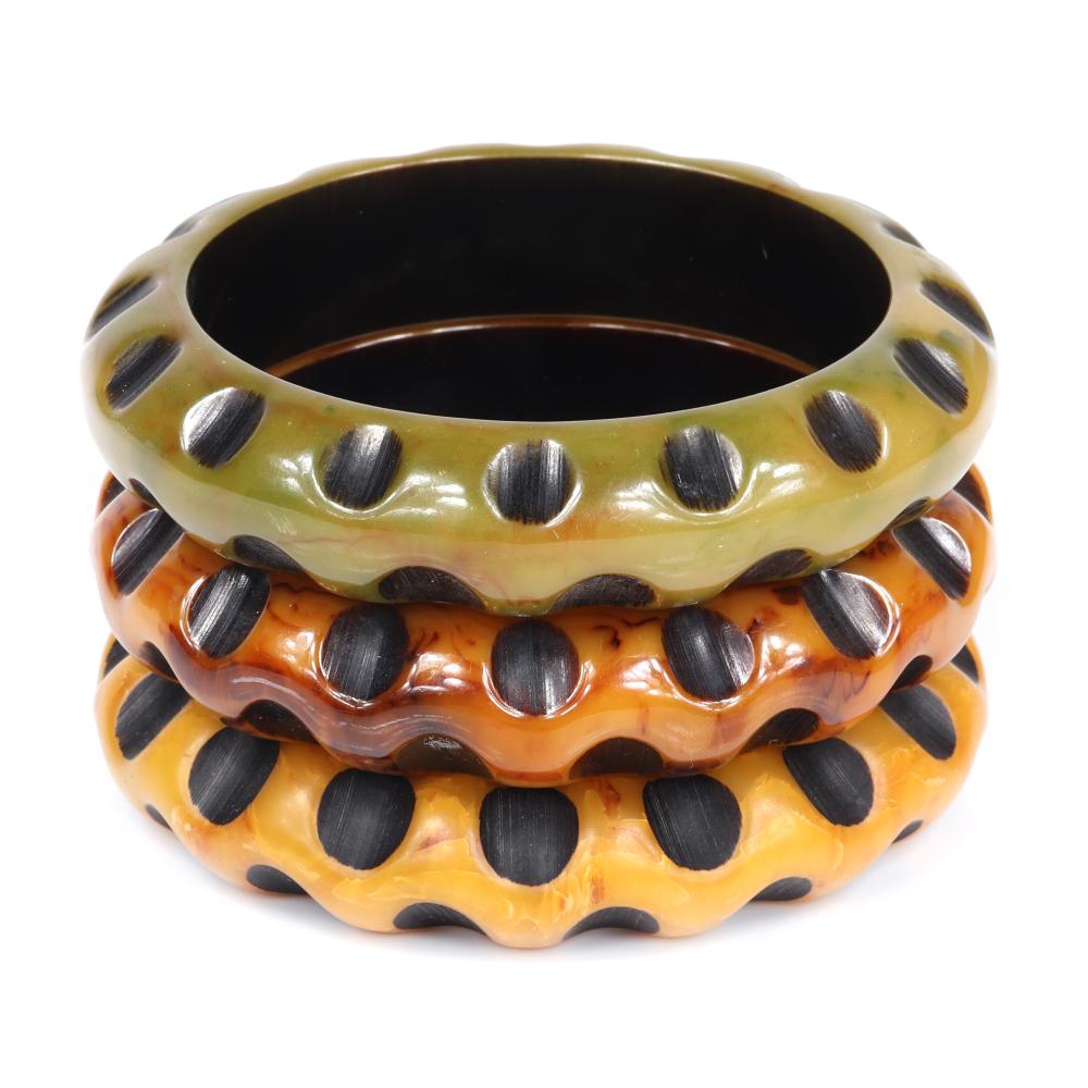 Appraisal: STACK OF MATCHING MARBLED BAKELITE BANGLE BRACELETS WITH SHAVED CUT