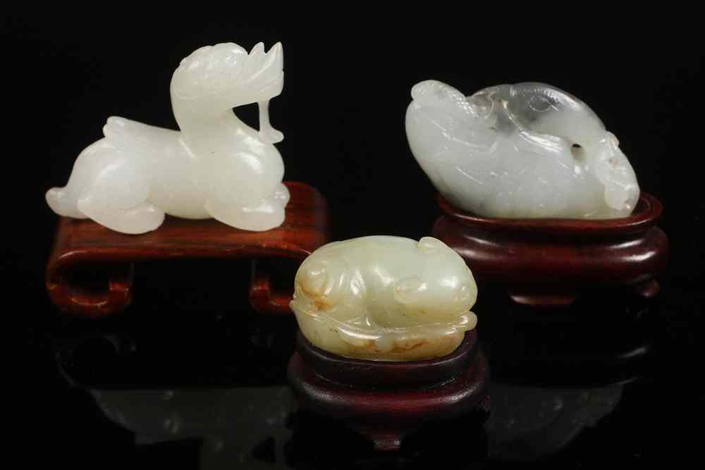 Appraisal: MINIATURE CHINESE JADE CARVINGS - Three th c or earlier