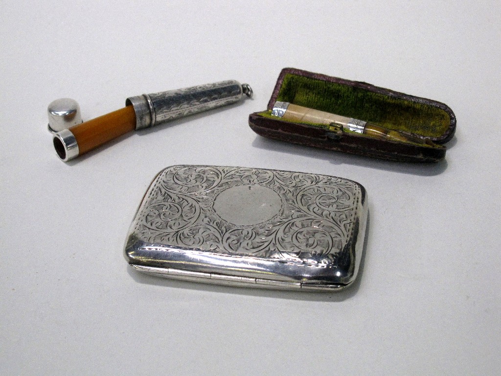 Appraisal: Lot comprising two cigarette holders one in silver case and