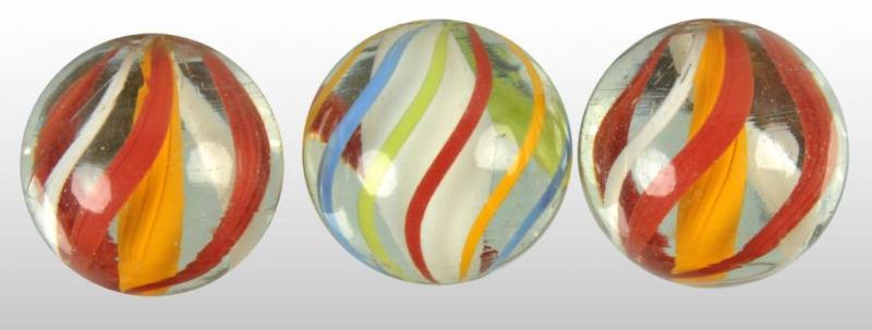 Appraisal: Lot of Glass Ribbon Swirl Marbles Condition Size All Dia