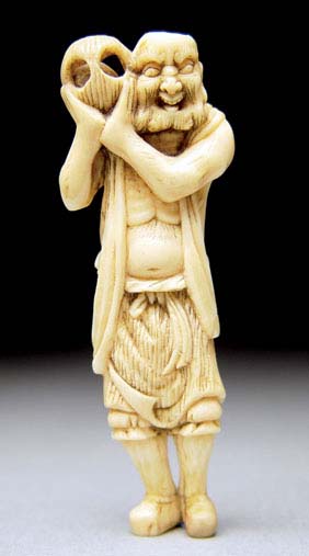 Appraisal: ANTIQUE IVORY NETSUKE Antique carved ivory netsuke of a foreigner