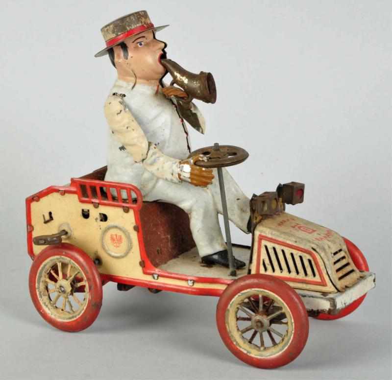 Appraisal: Tin Litho Lehmann Tut-Tut Wind-Up Toy German Working Original lamps