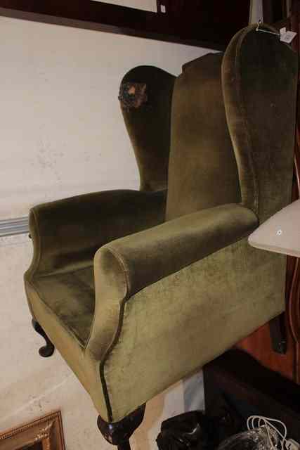 Appraisal: AN EARLY VICTORIAN UPHOLSTERED ARMCHAIR the square tapering legs terminating