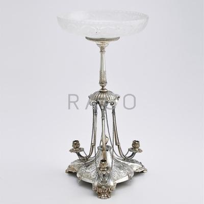 Appraisal: VICTORIAN SILVER AND CRYSTAL CENTERPIECE Tri-part candle stands support an