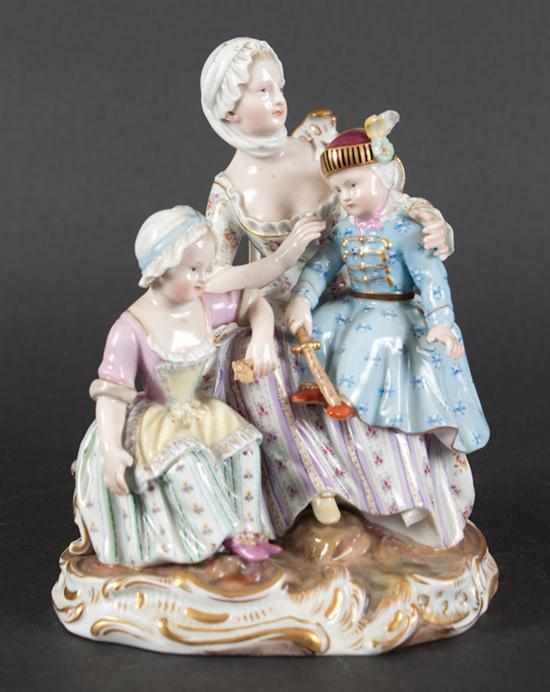 Appraisal: Meissen porcelain figural group late th century modeled as seated