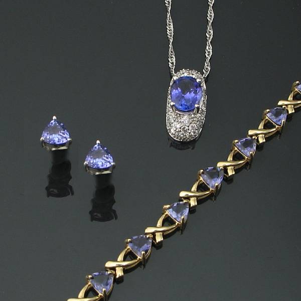 Appraisal: A group of tanzanite and k white and yellow gold