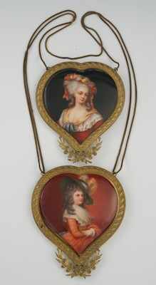 Appraisal: A Pair of Hand Painted Porcelain Plaques Suspended as Pendants